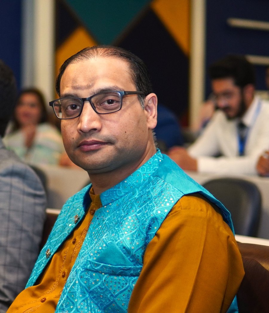Dr. Raja Irfan Sabir delivering a corporate training session